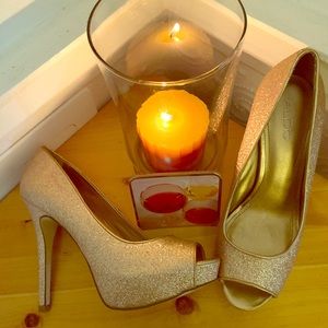 ALDO Gold Glitter Platform shoes.